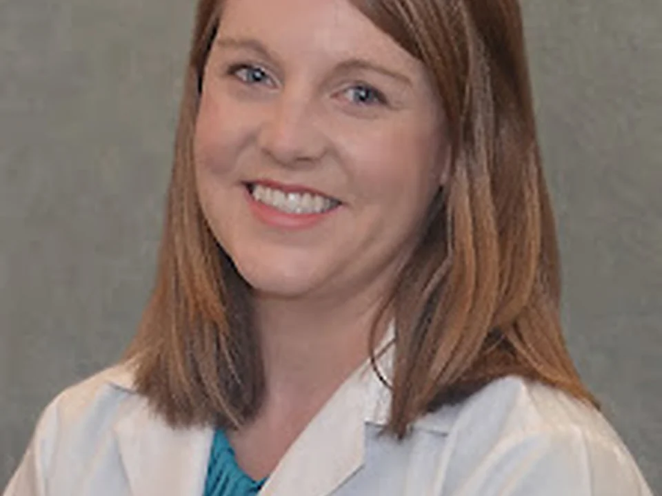 Donna Evelyn Corbett, Au. D.